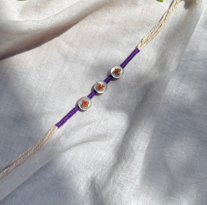 Violet Button Rakhi