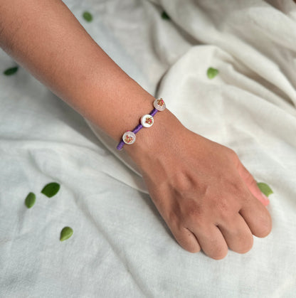 Violet Button Rakhi