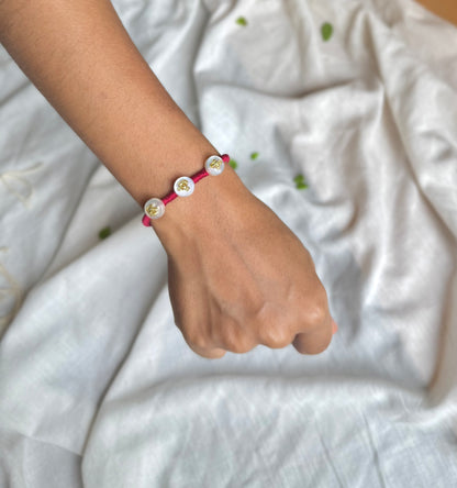 Wine Button Rakhi