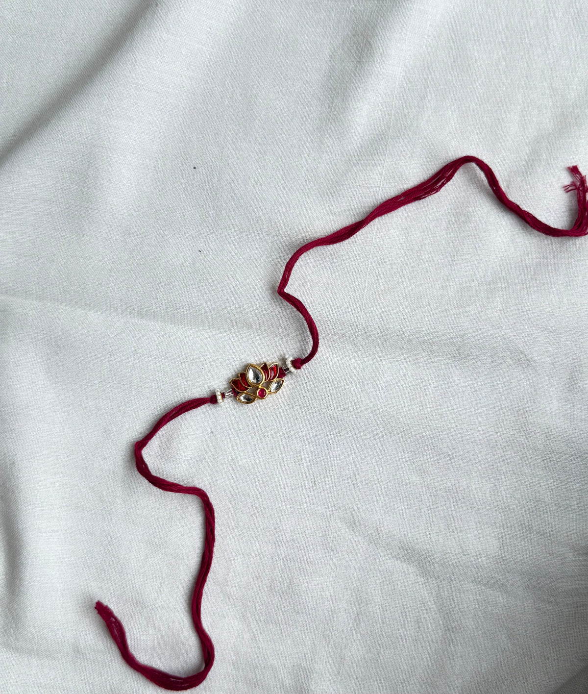 Maroon Lotus Rakhi