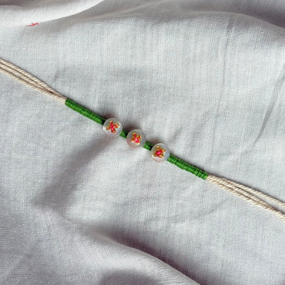 Green Button Rakhi