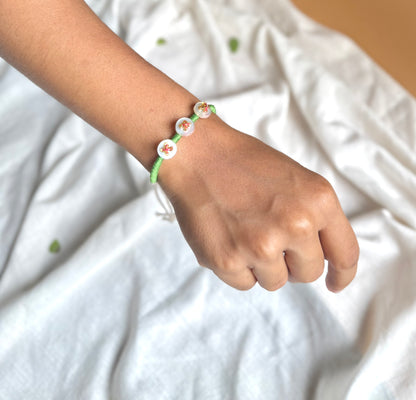 Green Button Rakhi