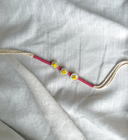 Rust Button Rakhi