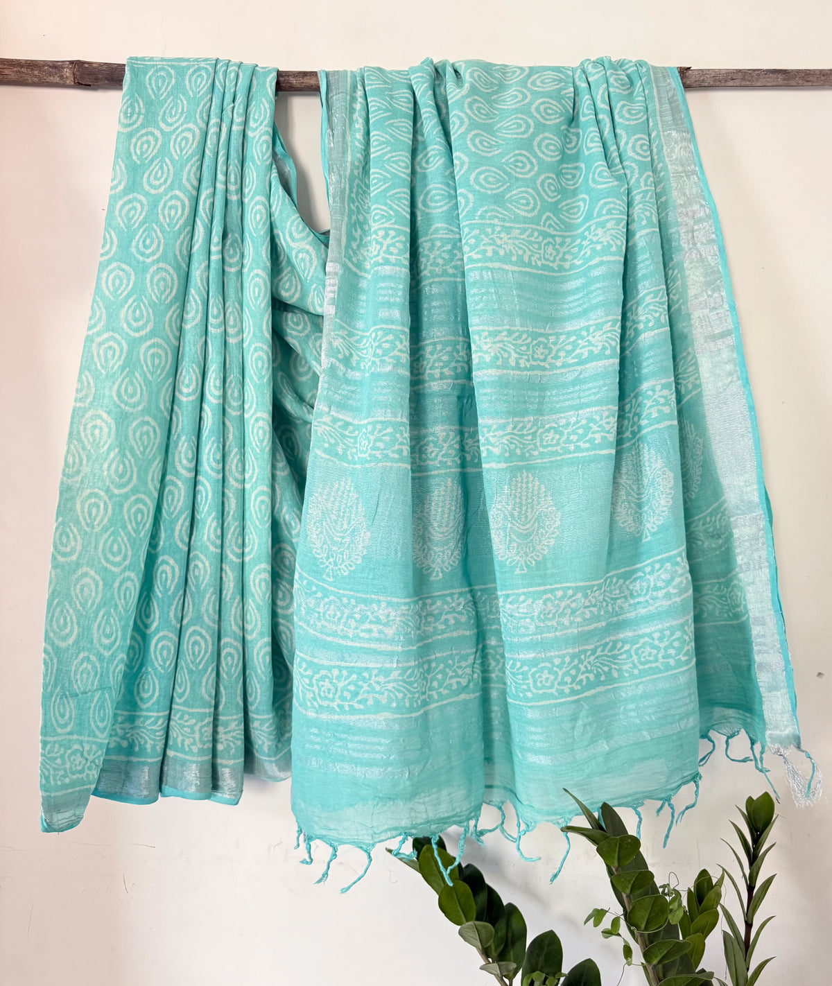 Pastel mint lock print saree with silver zari border in cotton linen fabric for everyday wear 