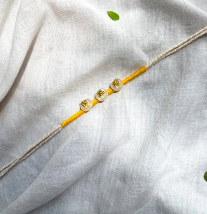 Yellow Button Rakhi